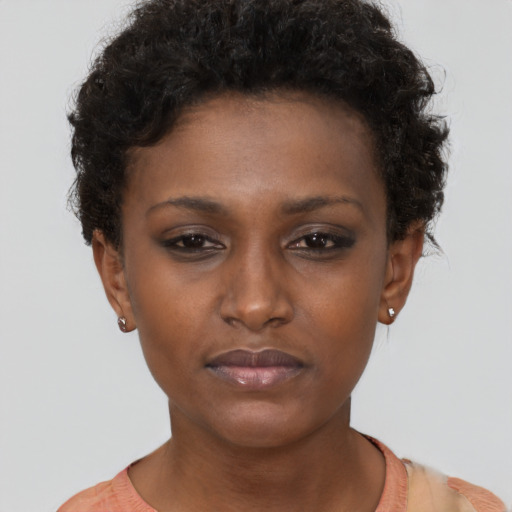 Neutral black young-adult female with short  brown hair and brown eyes