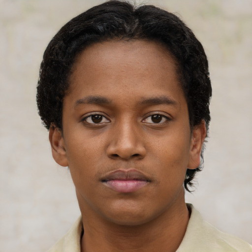 Neutral black young-adult female with short  brown hair and brown eyes