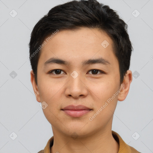 Joyful asian young-adult male with short  brown hair and brown eyes