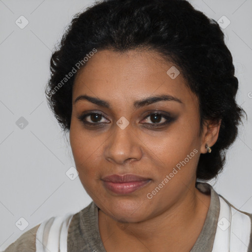 Joyful black young-adult female with medium  black hair and brown eyes