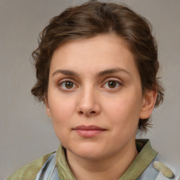 Neutral white young-adult female with medium  brown hair and green eyes