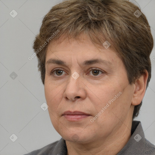 Joyful white adult female with short  brown hair and brown eyes