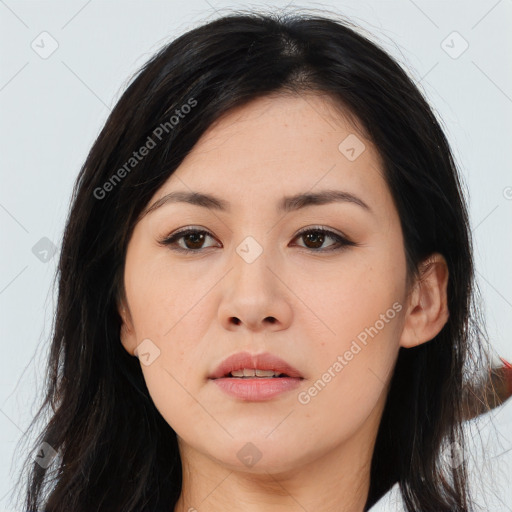 Joyful asian young-adult female with long  black hair and brown eyes