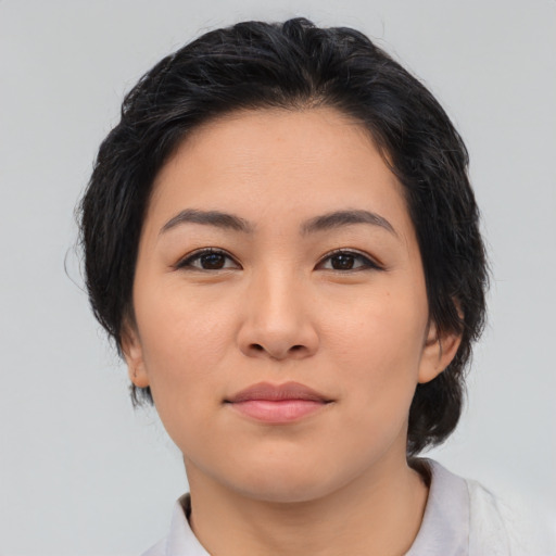 Neutral asian young-adult female with medium  brown hair and brown eyes
