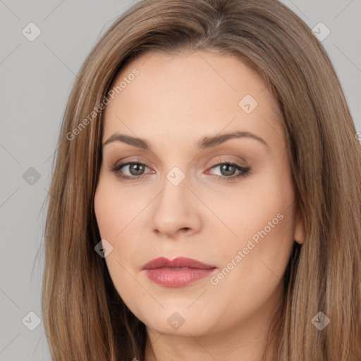 Neutral white young-adult female with long  brown hair and brown eyes