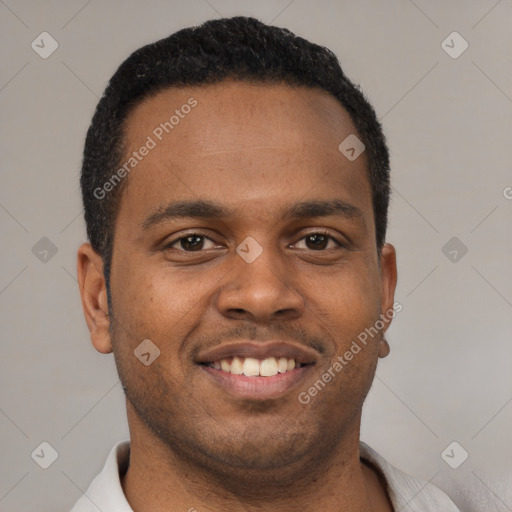 Joyful latino young-adult male with short  brown hair and brown eyes