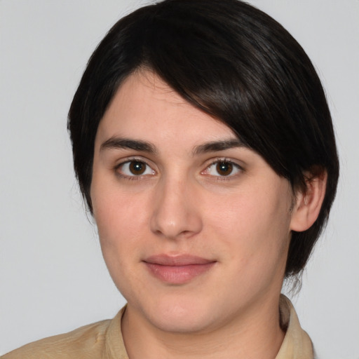 Joyful white young-adult female with medium  brown hair and brown eyes