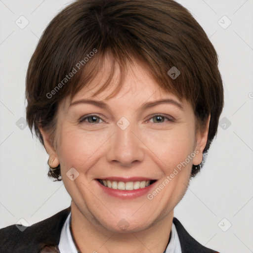 Joyful white adult female with short  brown hair and brown eyes