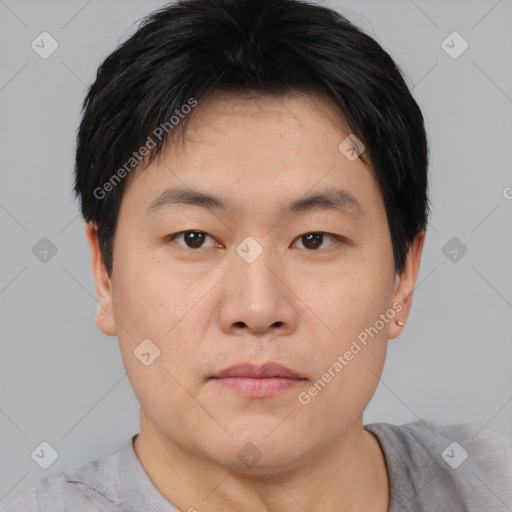 Neutral asian young-adult male with short  brown hair and brown eyes