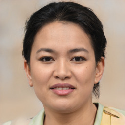 Joyful asian young-adult female with medium  brown hair and brown eyes