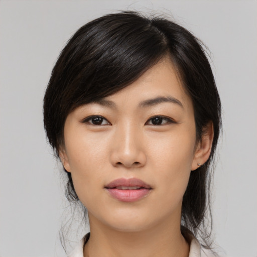Neutral asian young-adult female with medium  black hair and brown eyes