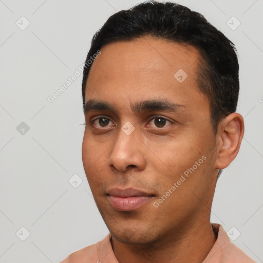 Neutral latino young-adult male with short  black hair and brown eyes