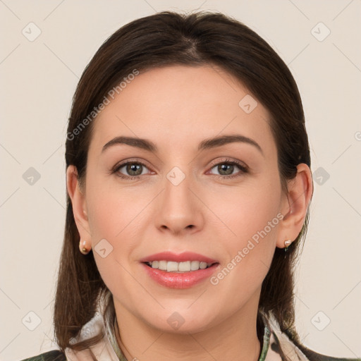 Joyful white young-adult female with long  brown hair and grey eyes