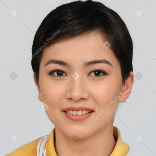 Joyful asian young-adult female with short  brown hair and brown eyes