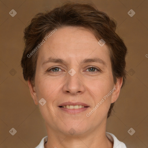 Joyful white adult female with short  brown hair and grey eyes