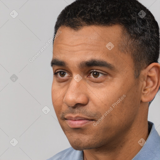 Neutral white young-adult male with short  black hair and brown eyes