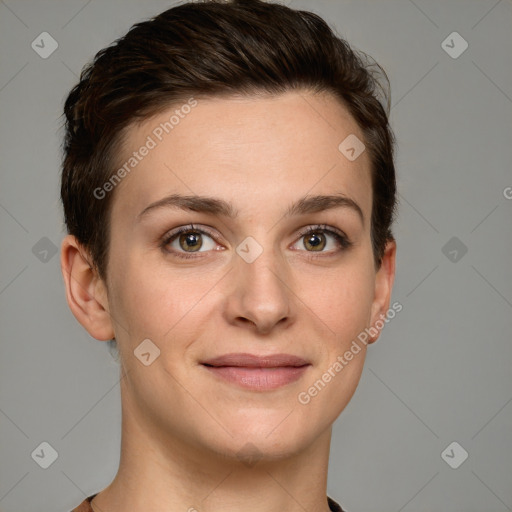 Joyful white young-adult female with short  brown hair and grey eyes