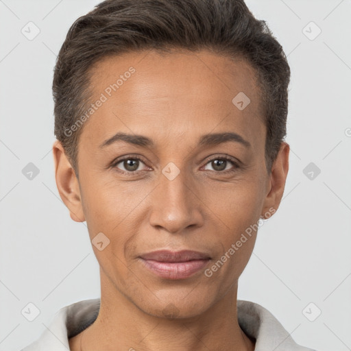 Joyful white adult female with short  brown hair and brown eyes