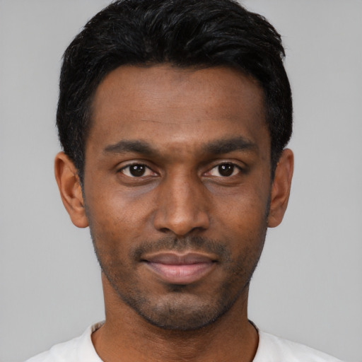 Neutral black young-adult male with short  black hair and brown eyes
