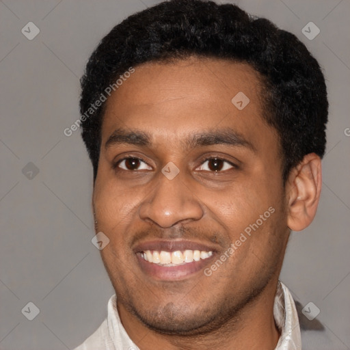 Joyful latino young-adult male with short  black hair and brown eyes