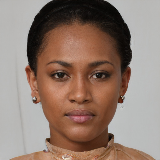 Neutral black young-adult female with short  brown hair and brown eyes