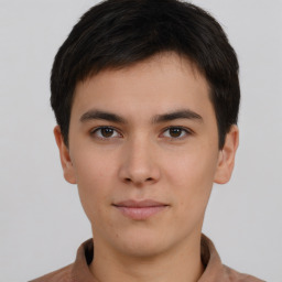 Neutral asian young-adult male with short  brown hair and brown eyes