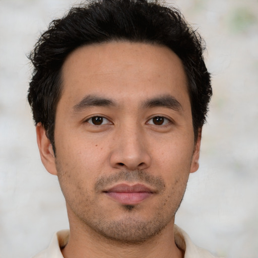 Neutral asian young-adult male with short  brown hair and brown eyes
