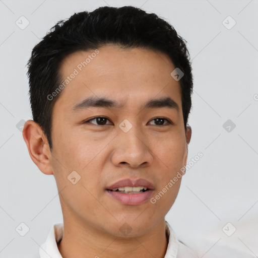 Joyful asian young-adult male with short  black hair and brown eyes