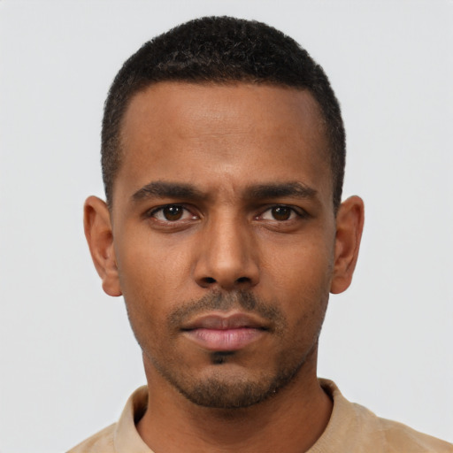 Neutral black young-adult male with short  black hair and brown eyes