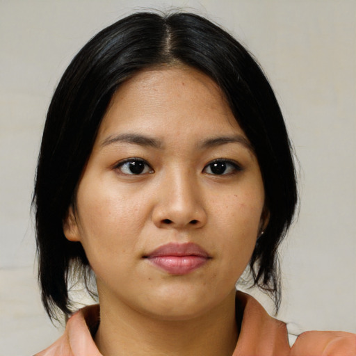 Neutral asian young-adult female with medium  black hair and brown eyes