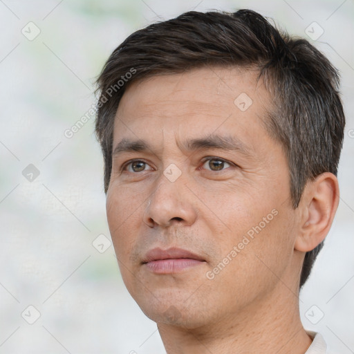 Neutral white adult male with short  brown hair and brown eyes