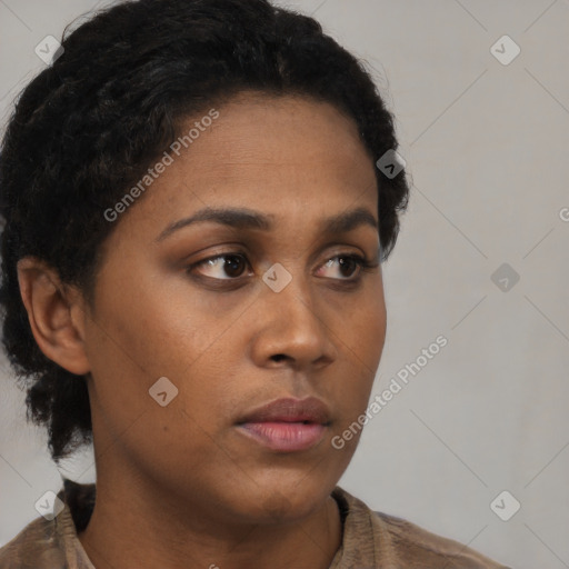 Neutral black young-adult female with short  brown hair and brown eyes