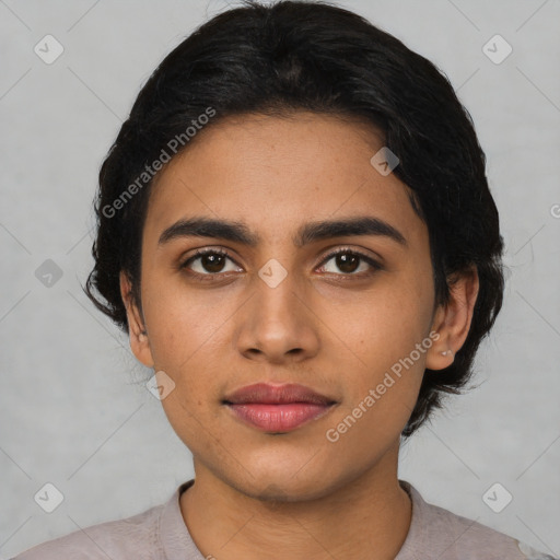 Joyful latino young-adult female with short  black hair and brown eyes