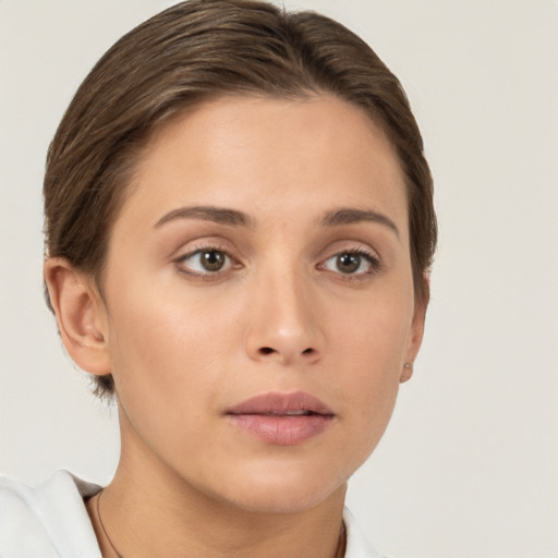 Neutral white young-adult female with short  brown hair and brown eyes