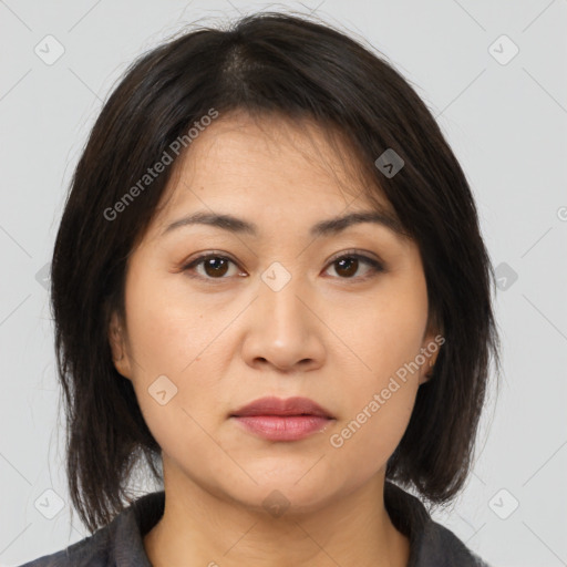 Neutral asian young-adult female with medium  brown hair and brown eyes