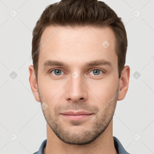 Neutral white young-adult male with short  brown hair and grey eyes