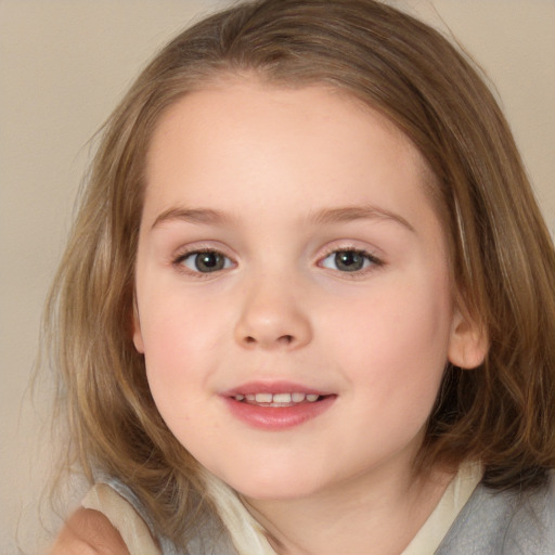 Joyful white child female with medium  brown hair and blue eyes