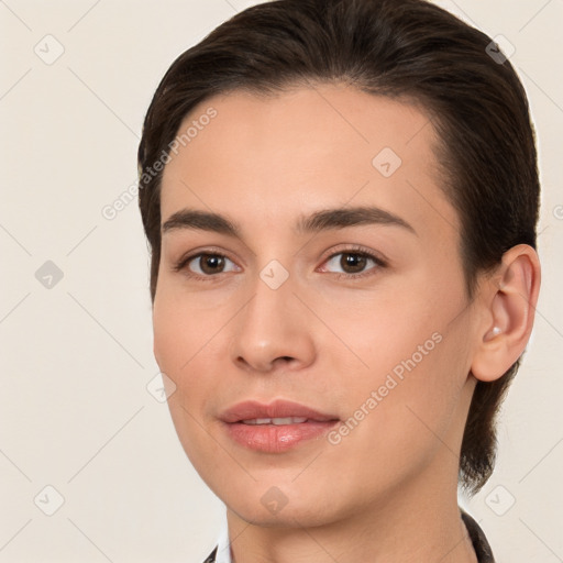 Joyful white young-adult female with medium  brown hair and brown eyes