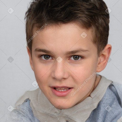 Joyful white child male with short  brown hair and brown eyes