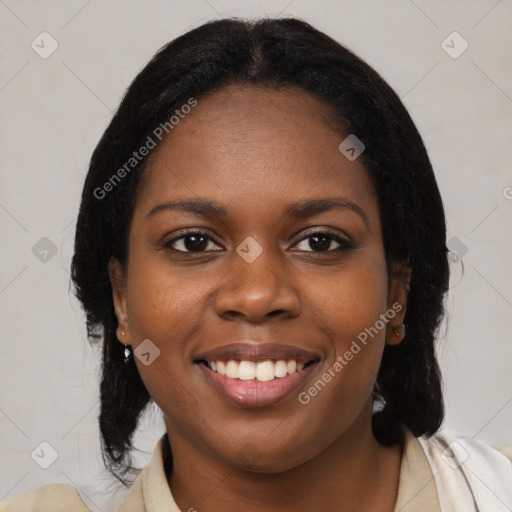 Joyful black young-adult female with medium  black hair and brown eyes