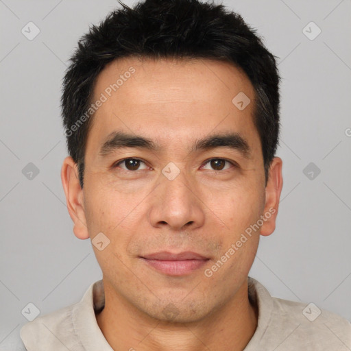 Joyful white young-adult male with short  black hair and brown eyes