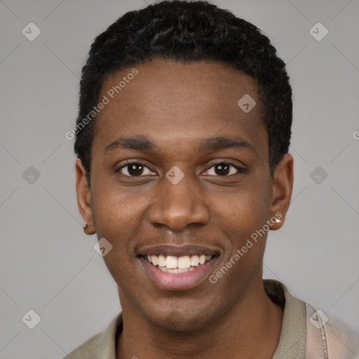 Joyful black young-adult male with short  black hair and brown eyes