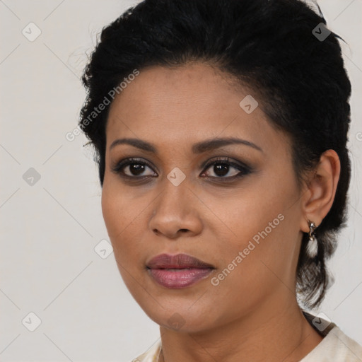 Joyful latino young-adult female with short  brown hair and brown eyes