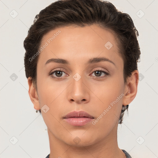 Neutral white young-adult female with short  brown hair and brown eyes