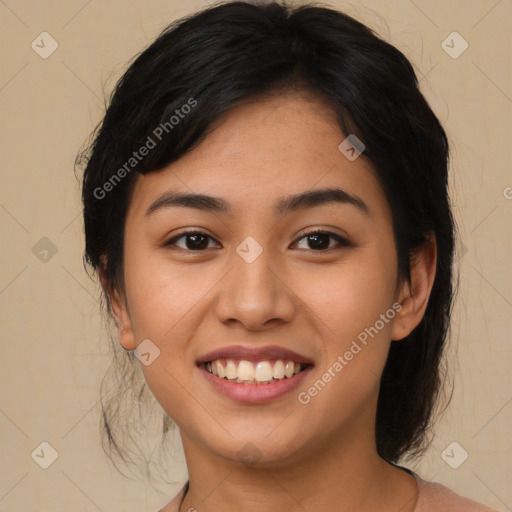 Joyful latino young-adult female with medium  brown hair and brown eyes