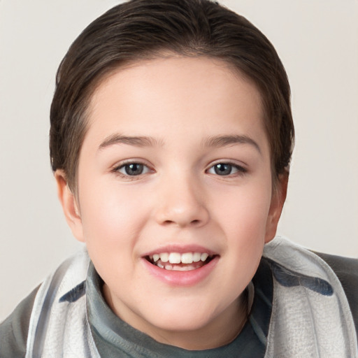 Joyful white child female with short  brown hair and brown eyes