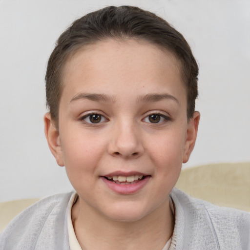 Joyful white child female with short  brown hair and brown eyes