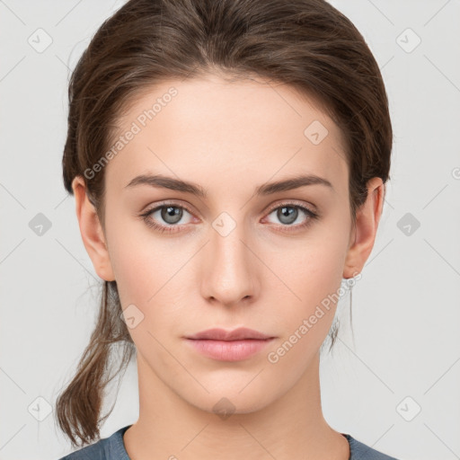 Neutral white young-adult female with medium  brown hair and grey eyes