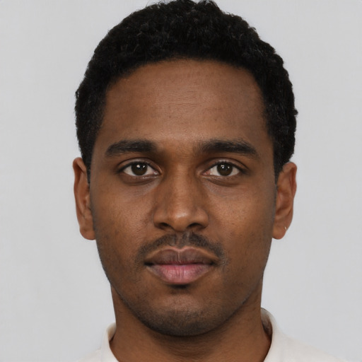 Neutral black young-adult male with short  black hair and brown eyes