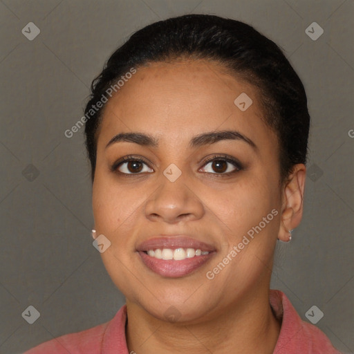 Joyful latino young-adult female with short  brown hair and brown eyes